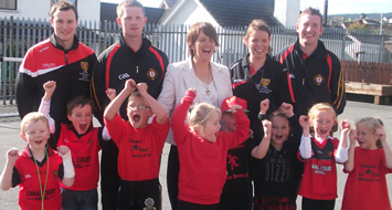 Newry school children celebrate ‘Red and Black Day’